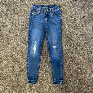 Distressed skinny jeans